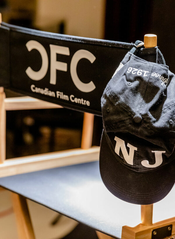 Norman Jewison hat hanging on the back of a CFC directors chair