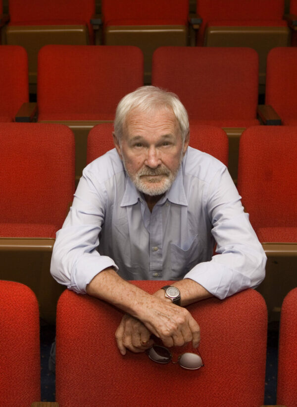 Norman Jewison sitting in theatre seats