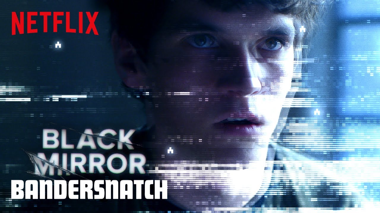 A headshot of a man with an overlay of a static screen texture. In the corner of the image the text reads: Black Mirror - Bandersnatch